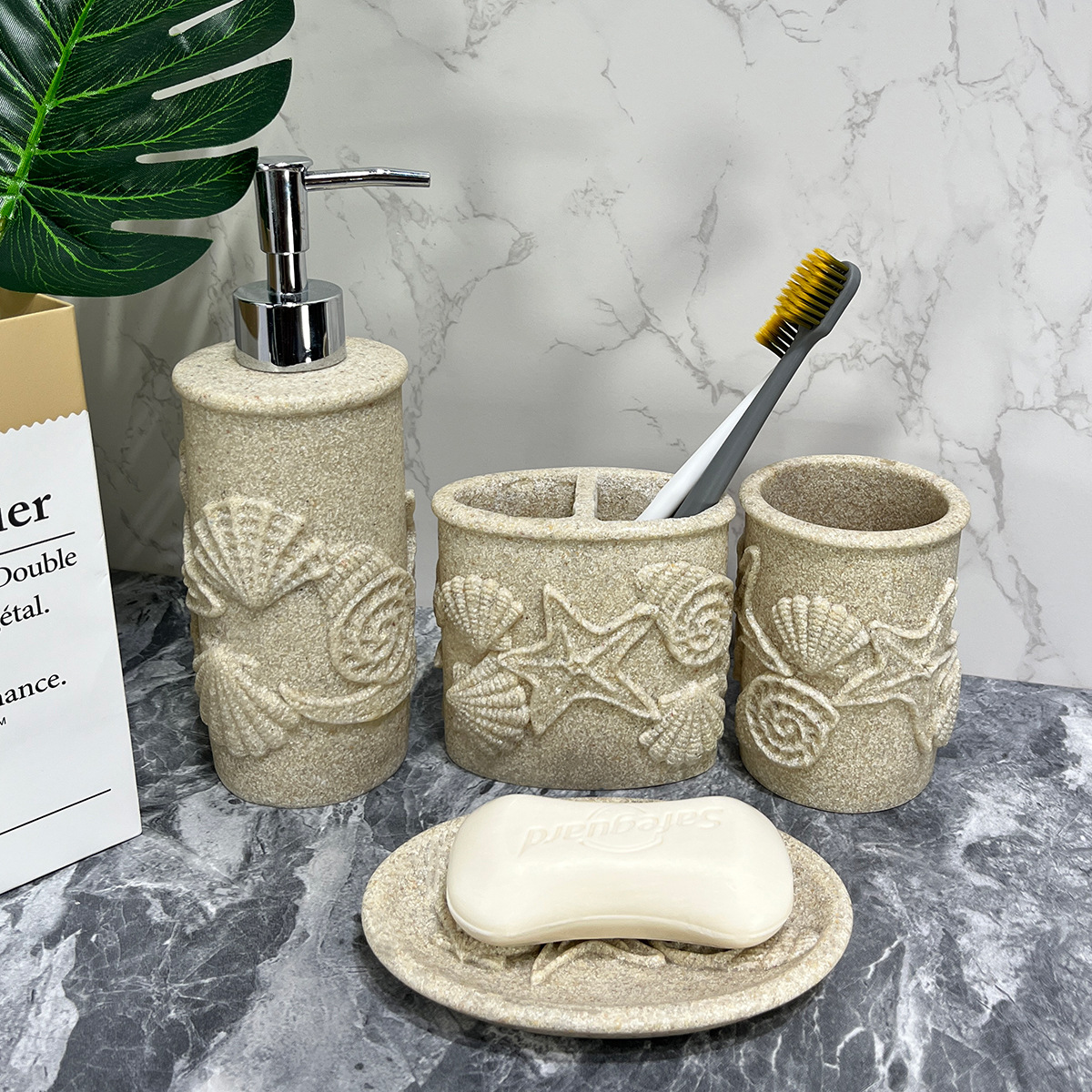 Baños de hotel de cuatro piezas de baño de arenisca imitación de diseño de baño de resina taza de jabón botella de desinfectante de manos