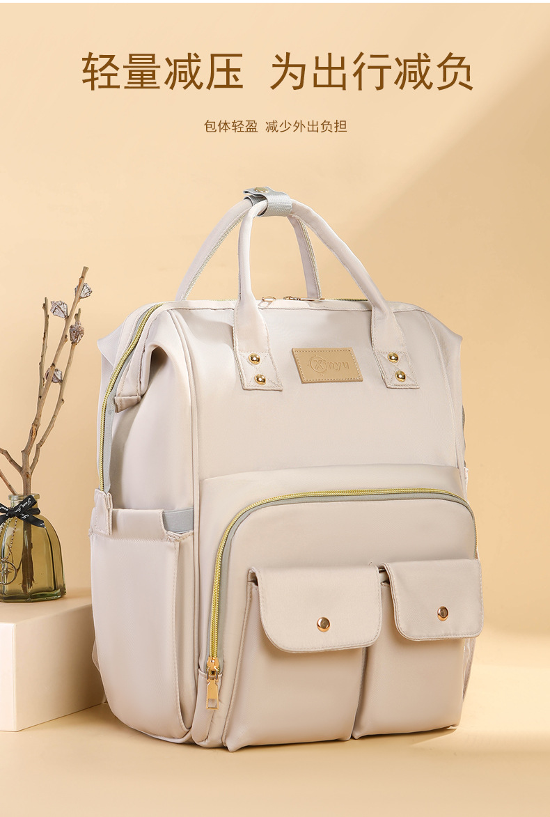 The 2025 new product is a high-end outdoor milk storage, heat preservation, large-capacity baby bag, multi-functional storage, and cross-border mommy bag undefined