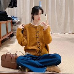 姜黄色复古撞色单排扣长袖针织毛衣女2025冬季新款保暖上衣