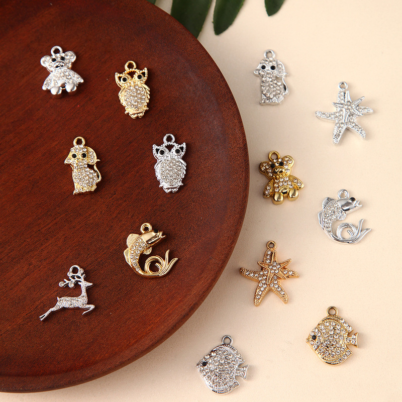 Ocean-themed diamond-studded small fish and starfish pendants, DIY jewelry accessories, cute animal charms (elephant, owl), and decorative ornaments