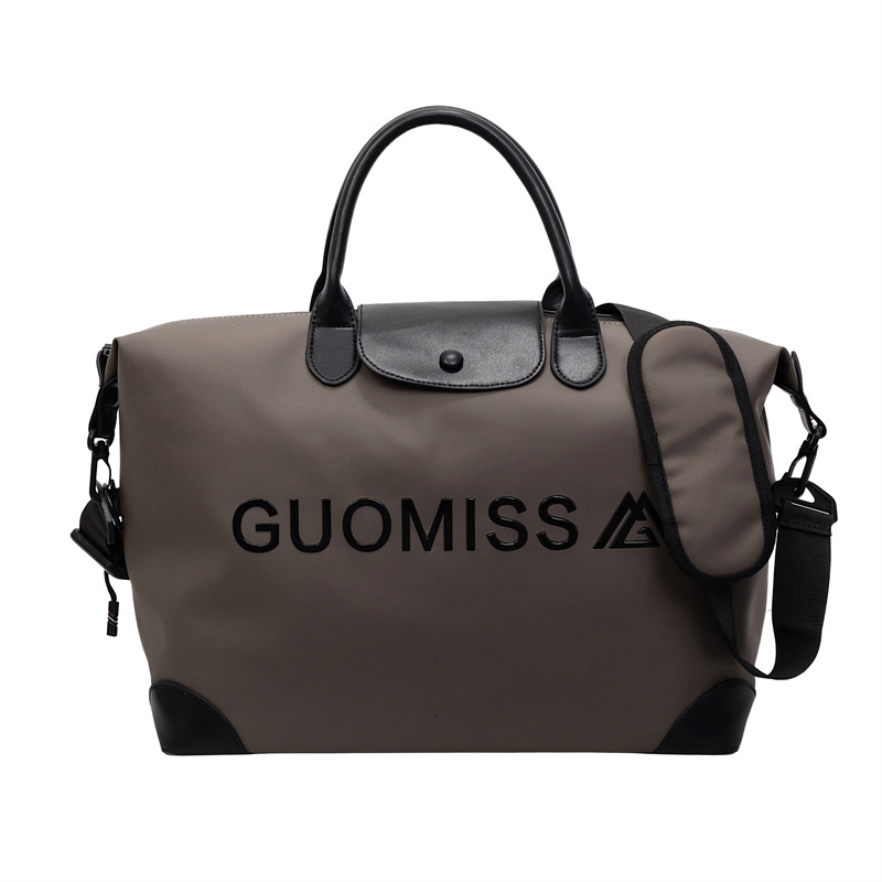 Bolsa de viaje para mujer transfronteriza nueva bolsa de gimnasio de yoga portátil de gran capacidad súper caliente bolsa de equipaje de viaje de corta distancia bolsa de mensajero