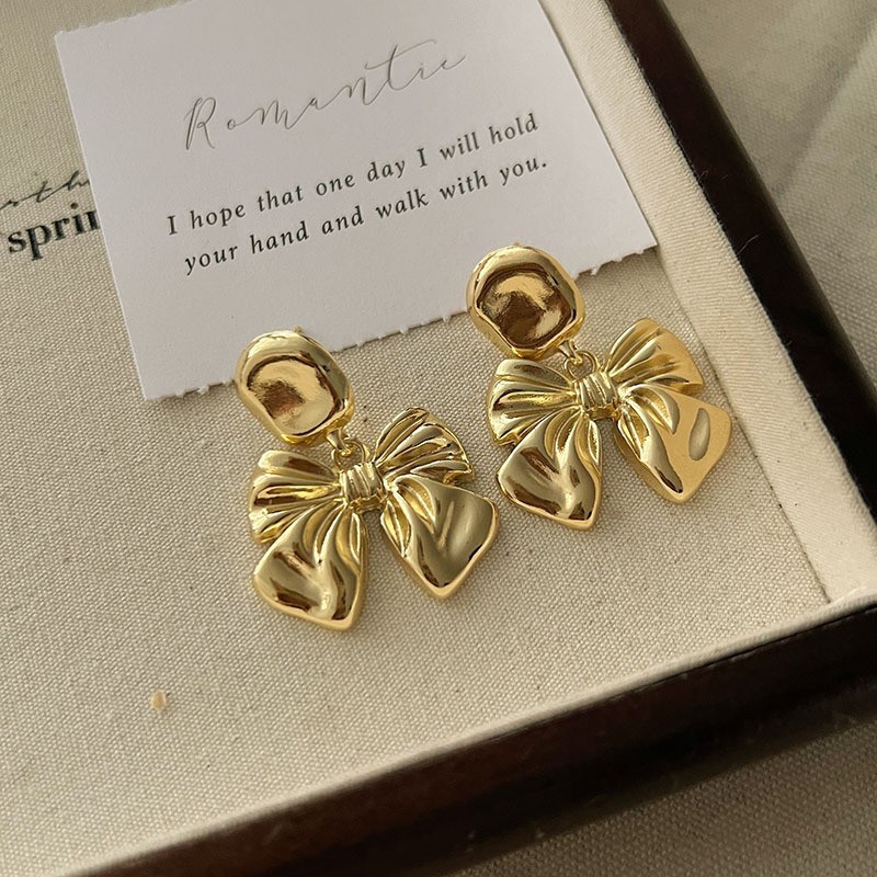 Pendientes de metal de alta gama, diseño minimalista y moderno, para mujer 2024, suministro al por mayor