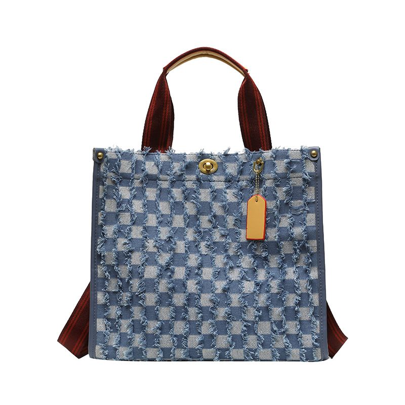 Bolso tote de mezclilla para mujer, nuevo estilo transfronterizo 2025, bolso de mano con borlas y diseño de tablero de ajedrez, bolso cruzado moderno grande y pequeño