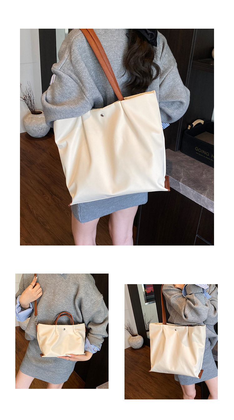 Borsa a tracolla casual da donna in tessuto Oxford, capiente, elegante e versatile, ideale per gli spostamenti quotidiani._voghion.com