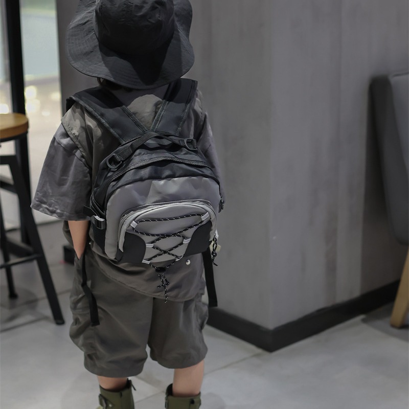 Corea del Sur mismo estilo Internet celebridad niños mochila de moda cool Boy moda contraste color pequeña mochila niños y niñas fuera bolsa de lona