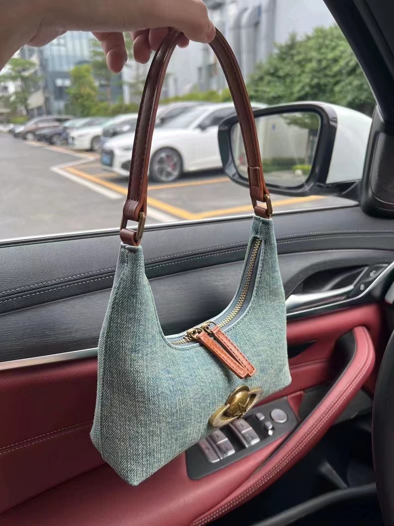 2024 Herbst und Winter Neue Unterarmtasche Wandering Planet Umhängetasche Vielseitige Handtasche Nischen-Denim-Unterarmtasche Großhandel_voghion.com