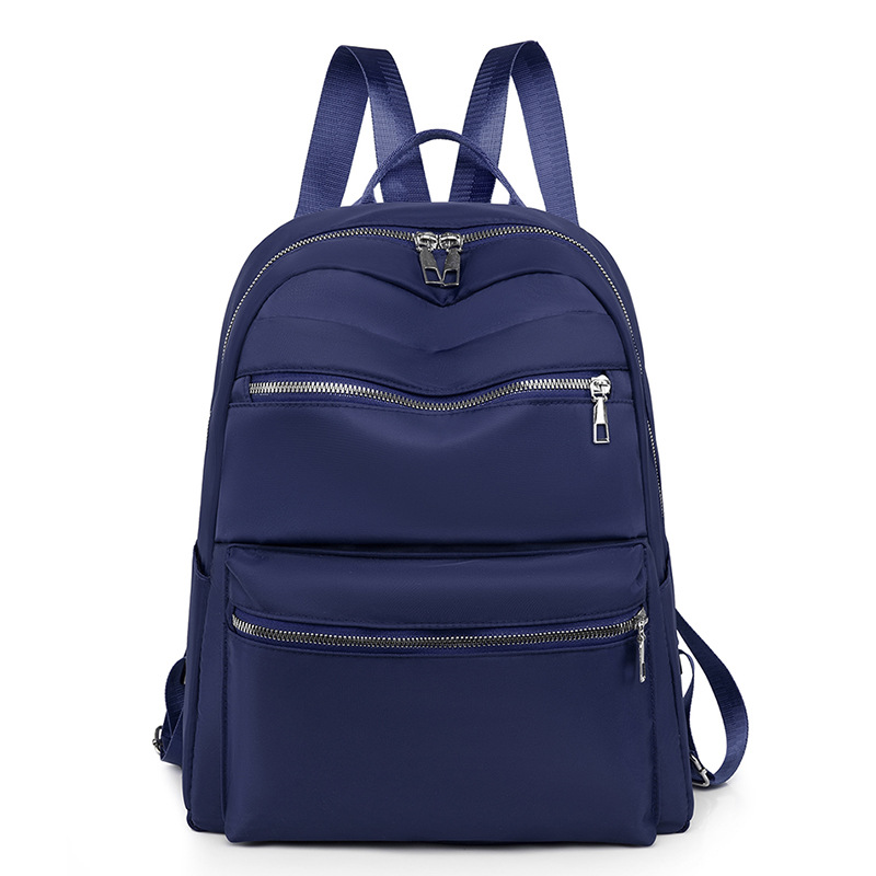 Mochila de tela Oxford para mujer 2023 nuevo estilo casual color sólido mochila para computadora de gran capacidad mochila de viaje al aire libre al por mayor