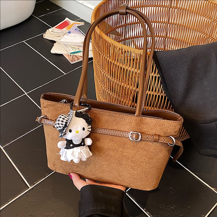 Otoño y invierno retro gamuz de hombro bolso de brazo para mujeres de viaje versátil bolso de mano simple 2025 nuevo bolso