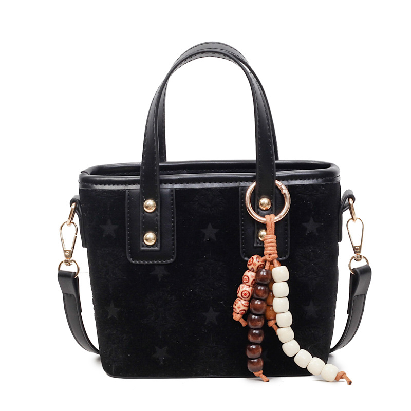 Popularidad transfronteriza retro bolso de cubo portátil para mujeres otoño / invierno 2025 nueva moda versátil bolso de hombro simple mochila