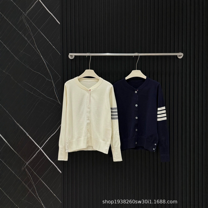 Autumn new arrival: a casual and versatile striped knit cardigan with a camellia design on the back, perfect for a preppy, collegiate look