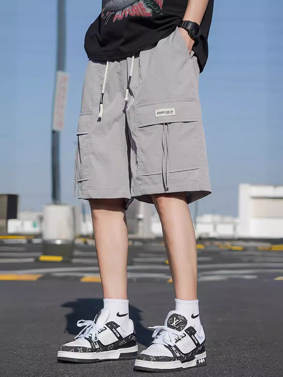 Pantalones cortos de trabajo de verano para hombres, pantalones de secado rápido de hielo, pantalones de tendencia, pantalones largos y casuales.