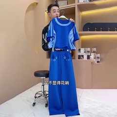 ヨーロッパカジュアルスポーツスーツ女性のための夏2025新しいスタイルファッショナブルなデザインコントラストカラー半袖ツーピーストレンディセット