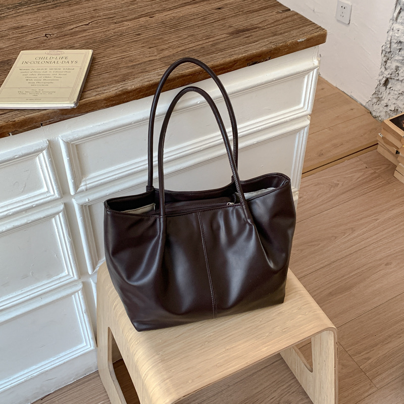 Bolso 2026 nuevo retro bolso de hombro de transporte de gran capacidad bolso de mujer simple y versátil bolso de brazo portátil