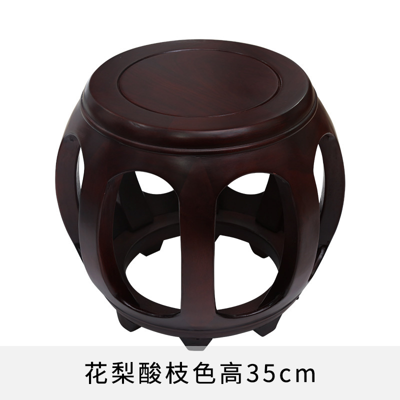 赤い木の太鼓の腰掛けの花梨の彫刻の古い凧の腰掛けの実木の丸い腰掛けの小さい低い腰掛けの手羽の木の家具の座の切り株の刺繍の酸っぱい枝の色|undefined