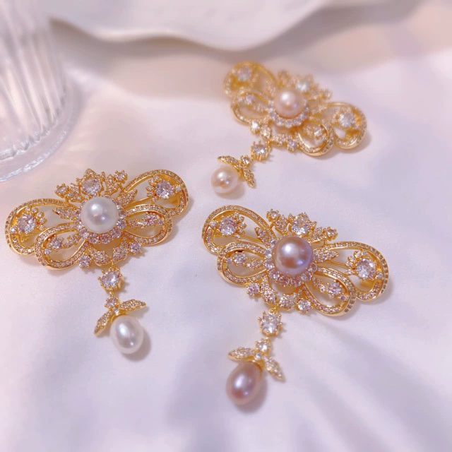 Cheongsam брошь высокого класса женщина 2024 новый натуральный пресноводный жемчуг корсак бант нишевые женские свитера