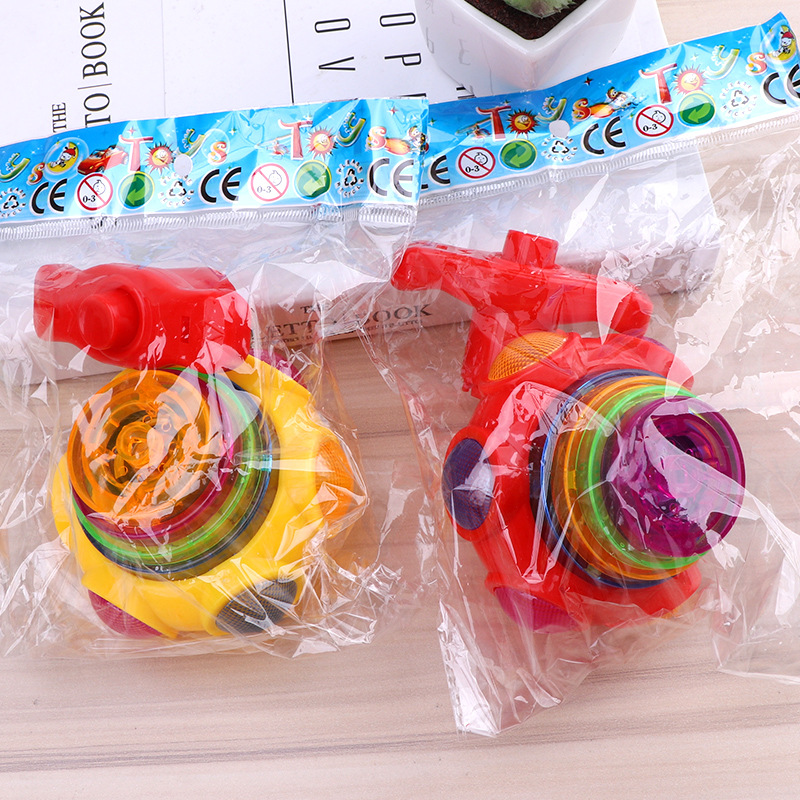 Juguete giroscópico para niños música ligera giroscopio giratorio niños y niñas 4-8 años puesto de parque regalos al por mayor