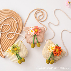 子供の2色の花の草は夏の新型の軽やかな女の子のかわいい小さいショルダーバッグの小銭入れの砂浜の甘い小さいカバンを編みます。