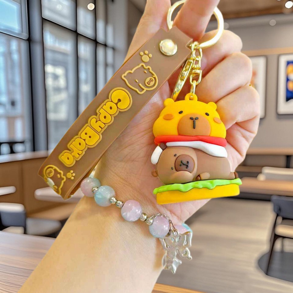 Nuevo llavero de Kapibala pareja mochila escolar colgante lindo capibara muñeca de PVC llavero de coche al por mayor