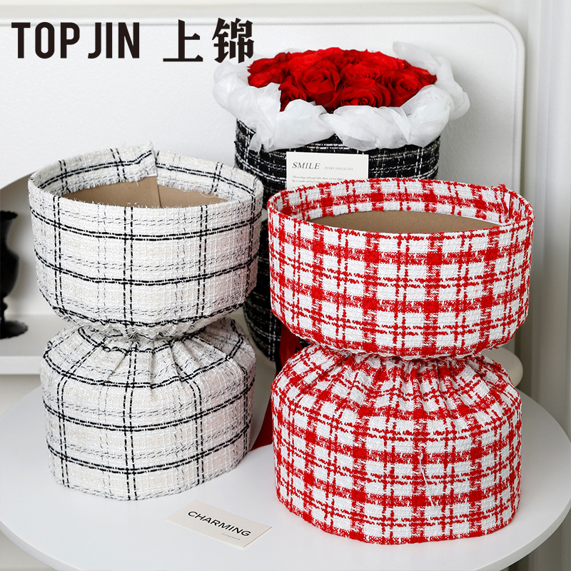 Material de embalaje de flores al por mayor nuevo estilo Chanel de una sola pieza que forma pieza redonda ramo bolsa de tela flor artefacto