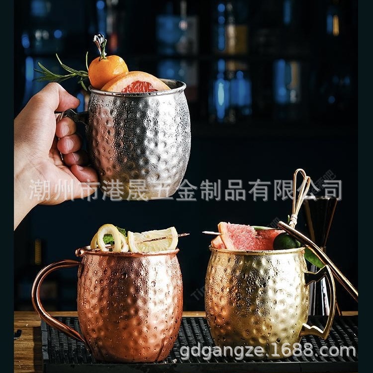 Nueva taza Moscow Mule de acero inoxidable de grado alimenticio, vaso de cóctel con superficie lisa en forma de tambor martillado y chapado en cobre pulido.