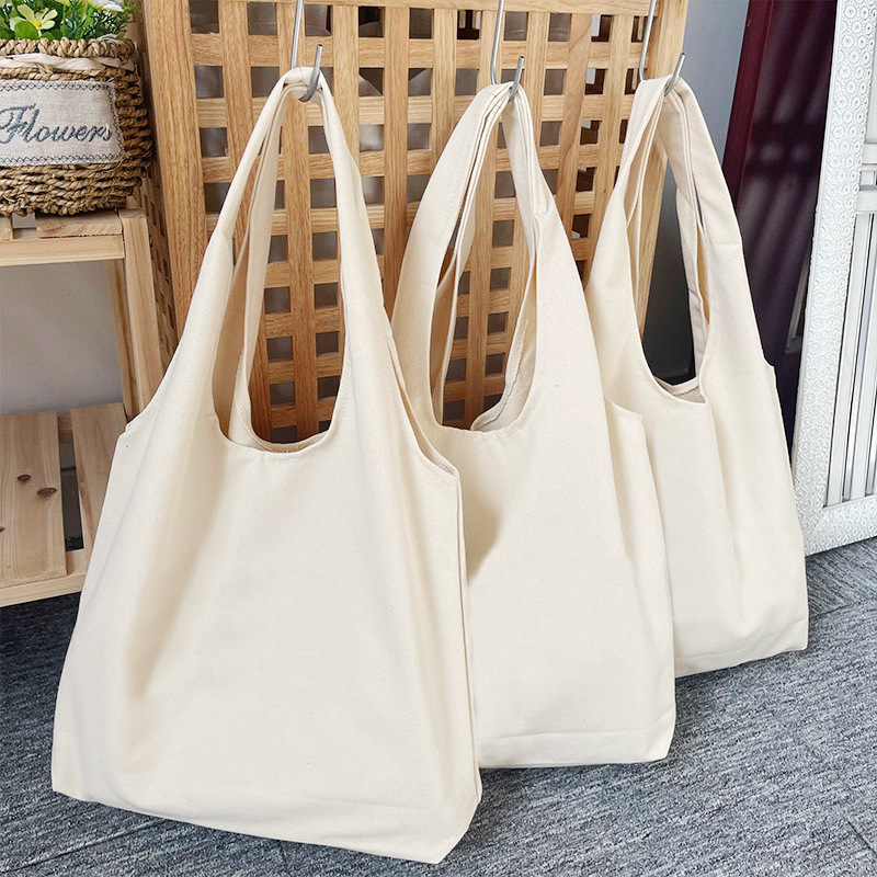 FUENTE Venta al por mayor de fábrica en blanco universal lienzo chaleco bolsa al por mayor creativo DIY bolsa de lona Portátil Bolsa De estudiante