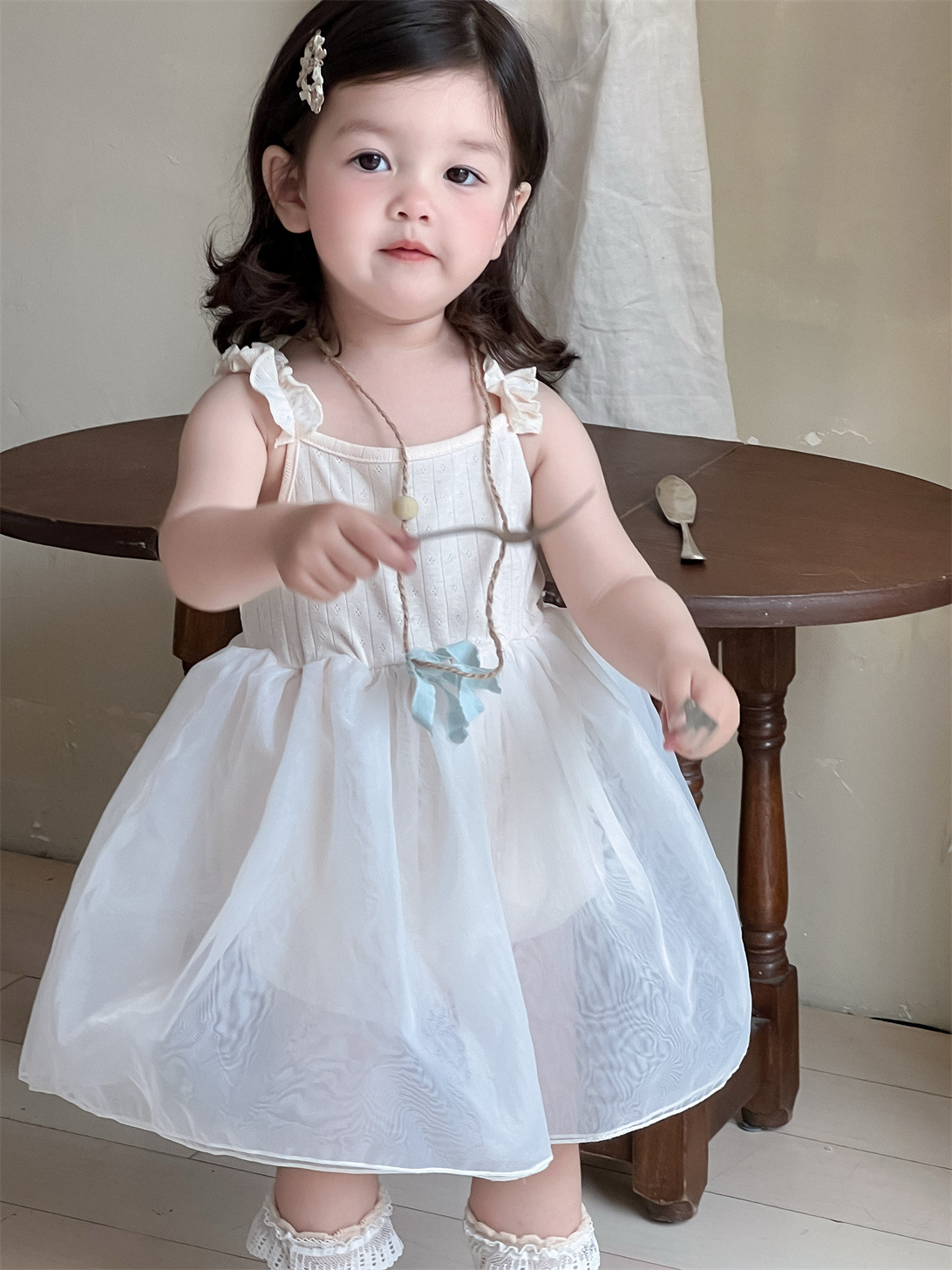 Vestido de malla para niñas, estilo fino de verano, ropa para niños coreanos, falda de trasero con correa de bebé, falda de princesa nueva 2025