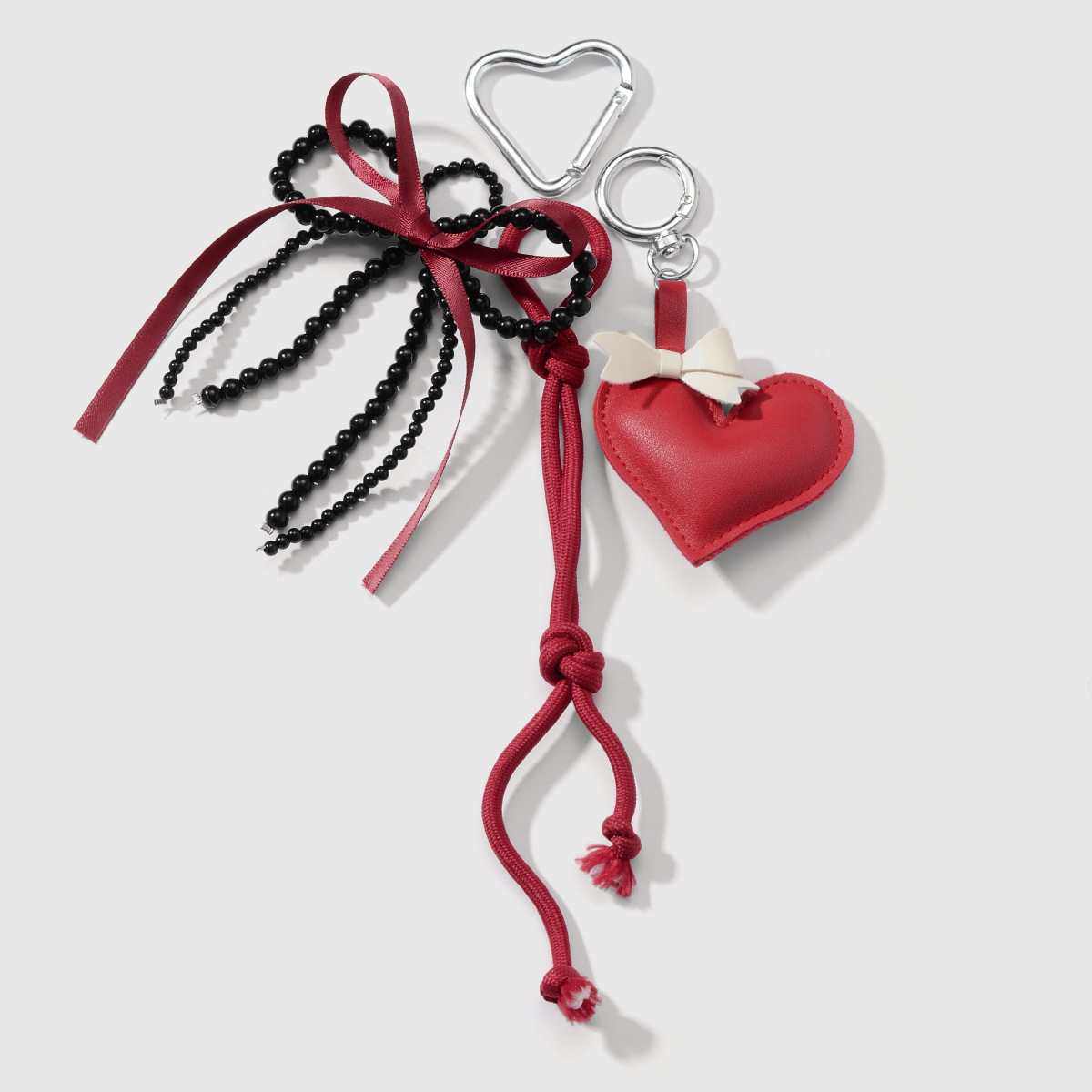 Primavera nuevo estilo ins dulce y cool moda personalidad leopardo amor cuentas hechas a mano arco llavero de cereza