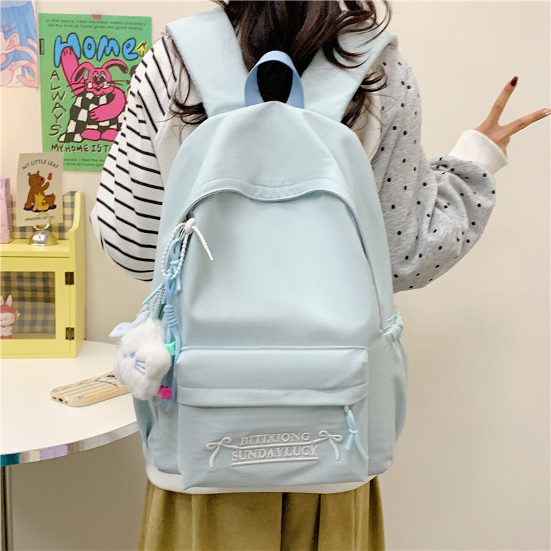 日系ins轻便简约纯色百搭大容量书包女初中高中大学生上课双肩包