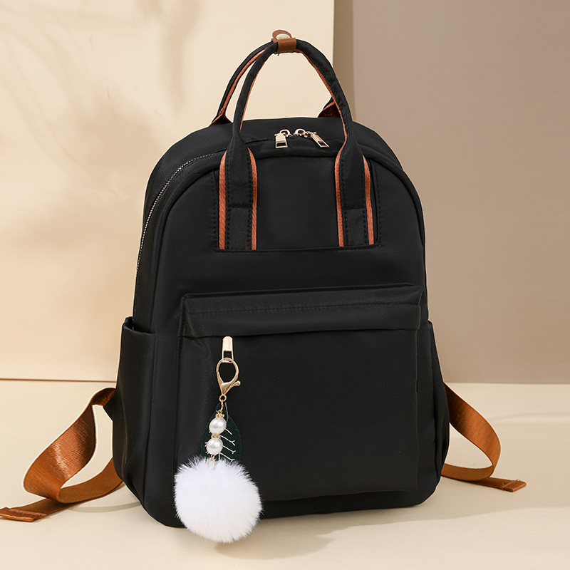 Mochila multiusos de gran capacidad para viajeros, nueva moda de color sólido, mochila de tela Oxford simple y versátil, viaje de gran capacidad