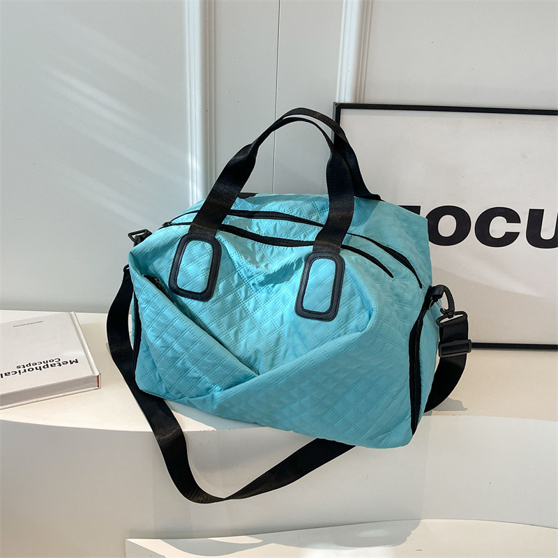 Bolso de mujer 2025 nuevo equipaje de viaje de gran capacidad, bolso de vacaciones de corta distancia de alta calidad.