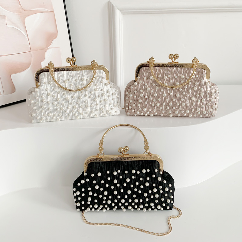 Bolso de las mujeres bolso de la cadena de la perla 2024 principios de primavera nueva moda bolso de hombro fresco dulce hermoso bolso crossbody de aspecto alto para las mujeres