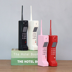 レトロなビッグブラザーの携帯電話のモデルの置物ネットレッドのレトロな携帯電話の時代の道具はクロスボーダーのバッチをまねます。