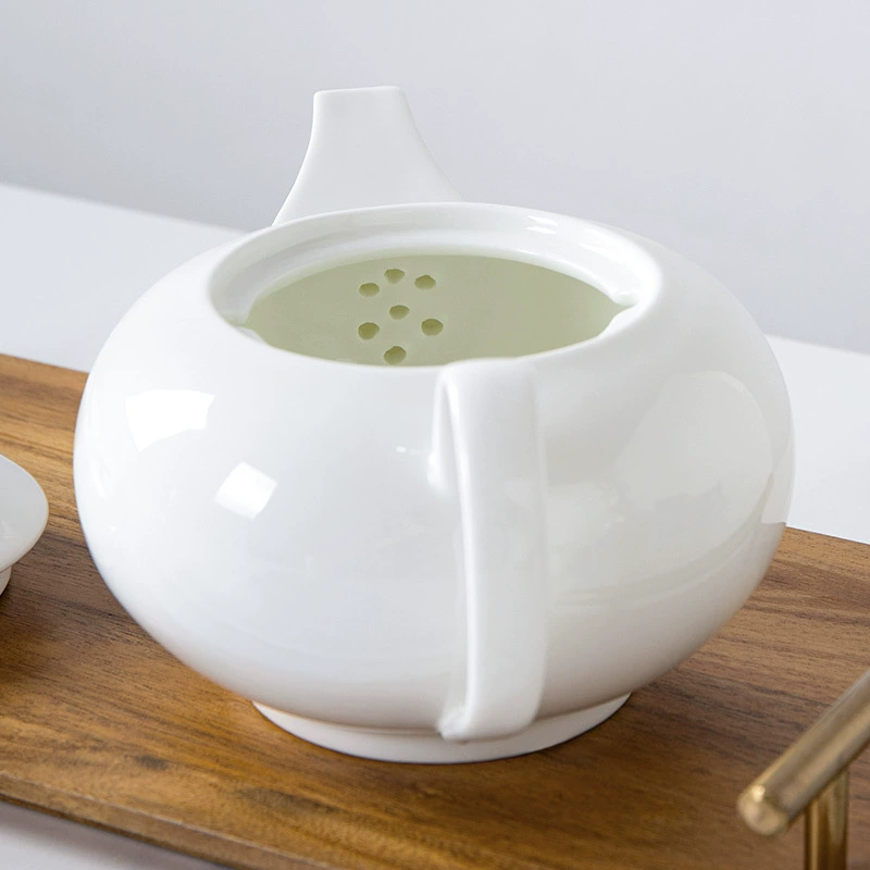 White teapot, capacious tea cup, summer tea set