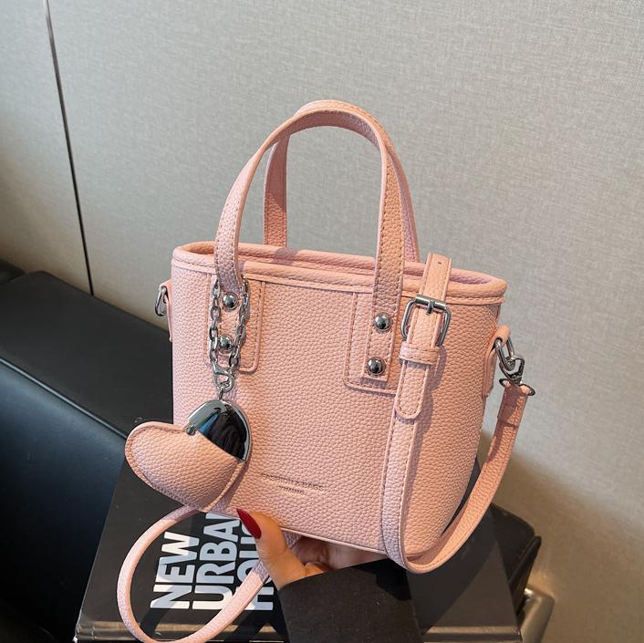 Bolso de cubo portátil transfronterizo simple y de alta gama para mujer 2025 nuevo bolso de hombro de estilo occidental de todo fósforo bolso de mensajero de moda