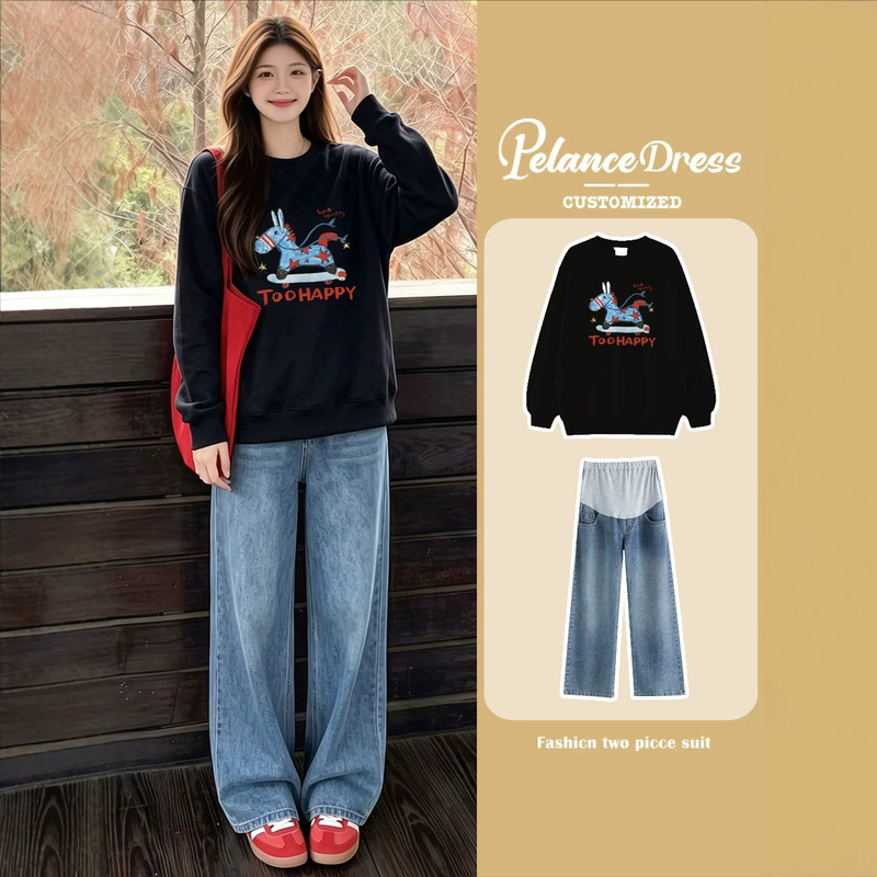 Maternity sweatshirt set 2026 spring/autumn loose cartoon top and wide-leg jeans for pregnancy, commuting, and prenatal check-ups Maternity sweatshirt set 2026 spring/autumn loose cartoon top and wide-leg jeans for pregnancy, commuting, and prenatal check-ups
