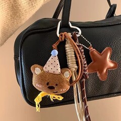 かわいいぬいぐるみの熊のバッグのストラップの登山ロープの手のひもの漫画の人形のストラップの車のキーホルダーの潮流のiu系