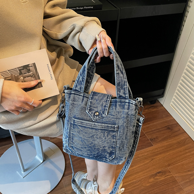 Transfronterizos retro vaqueros bolsos de hombro para hombres y mujeres, bolsos de bebé casuales y simples 2026 nuevos niños mochilas