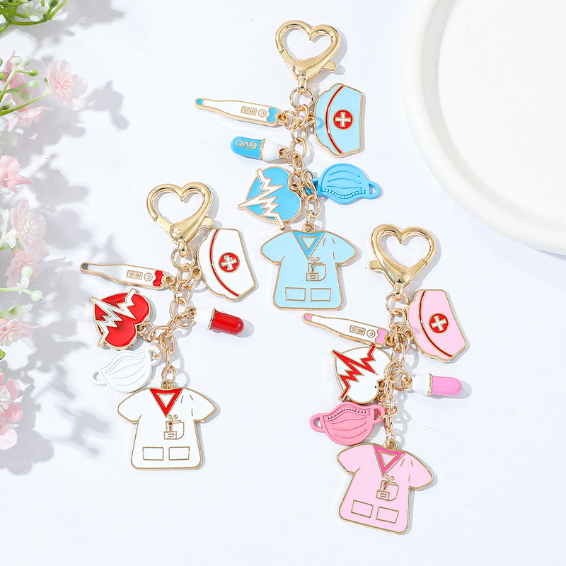 Classic nurse cap thermometer pill mask heartbeat nurse suit zinc alloy keychain decoration pendant Classic nurse cap thermometer pill mask heartbeat nurse suit zinc alloy keychain decoration pendant