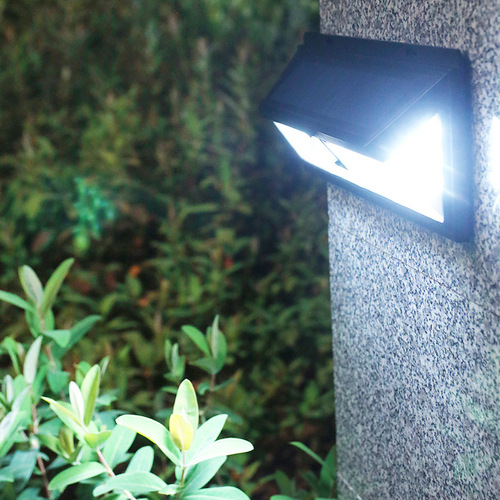 Solar lamp outdoor garden lamp household super bright human body sensor lamp wall lamp waterproof new rural LED lighting