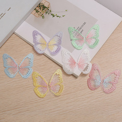 新年の赤い刺繍の蝶の翼はヘアピンの材料の部品を動かします。