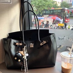 大容量プラチナトートバッグ女性2025新型ブリーフケースファッション通勤百合バッグ高級感ハンドバッグ