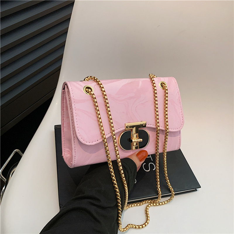 Nicho bolso de diseño bolso de mujer nuevo estilo de moda de marea de viento de bloqueo de hombro mochila de textura de cadena pequeña bolsa cuadrada de moda