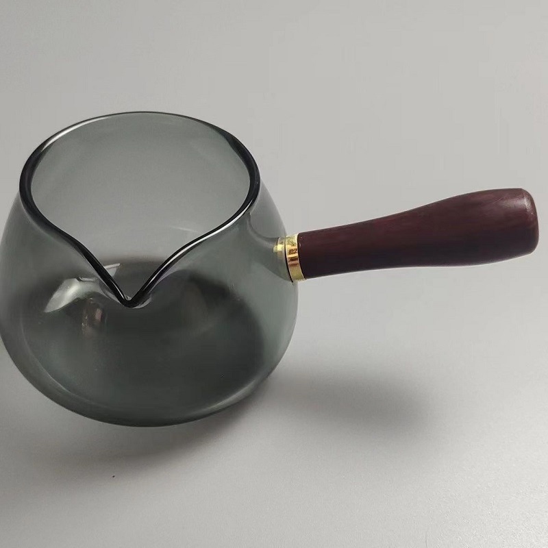 Nueva olla Xiaoyao 360 grados de vidrio borosilicato giratoria fabricante de té de vidrio juego de té traje hogar tetera