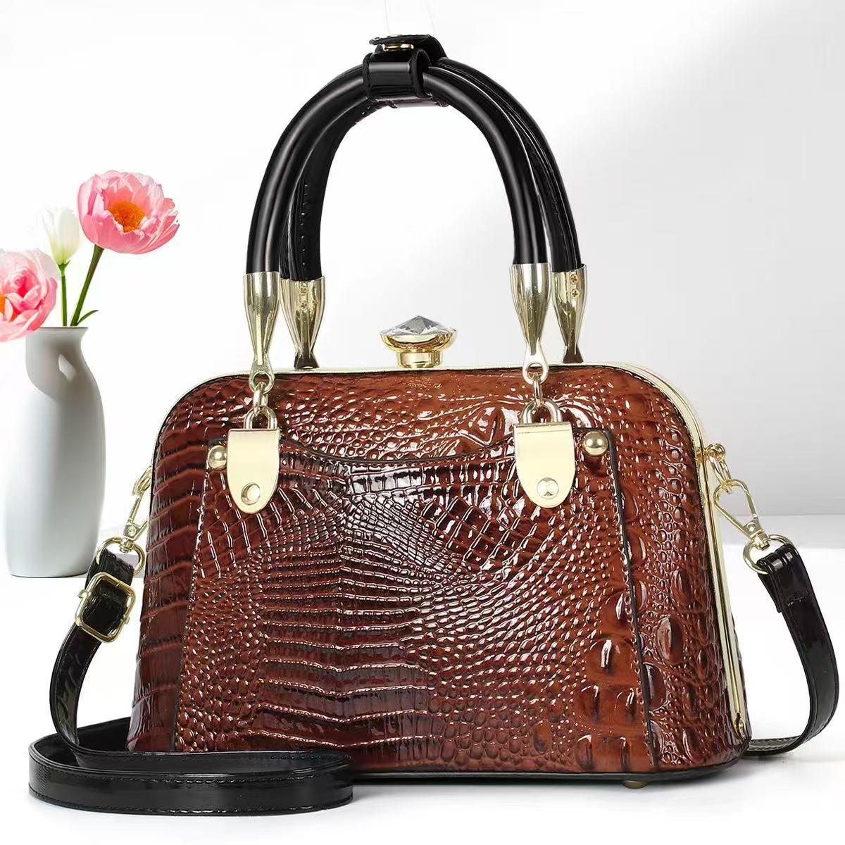 Bolsos de mujer verano nuevo estilo bolso de madre bolso de hombro de mediana edad bolso de mensajero de nicho de regalo de todo fósforo