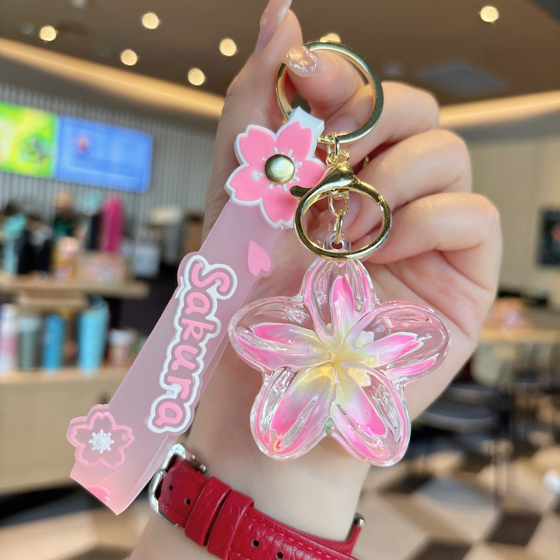 クリエイティブオイル入りプルメリアキーホルダー花液体流砂小さなペンダントバッグアクセサリーカップル小さなギフト|undefined