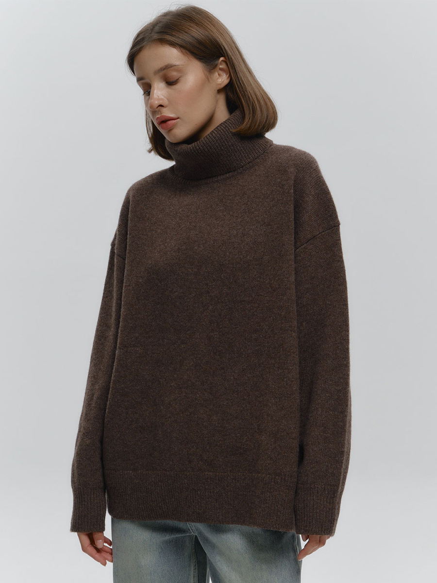Suéter suelto de cuello alto transfronterizo Europa y los Estados Unidos 2025 otoño y invierno nuevo simple camisa de punto de color sólido abrigo abrigo suéter de cabeza mujer