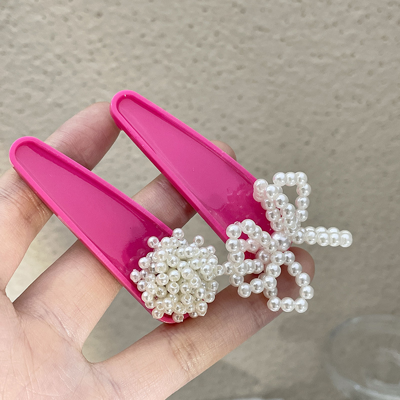 Women's Cute Round Bow Knot Plastic Inlay Artificial Pearls Hair Clip display picture 7