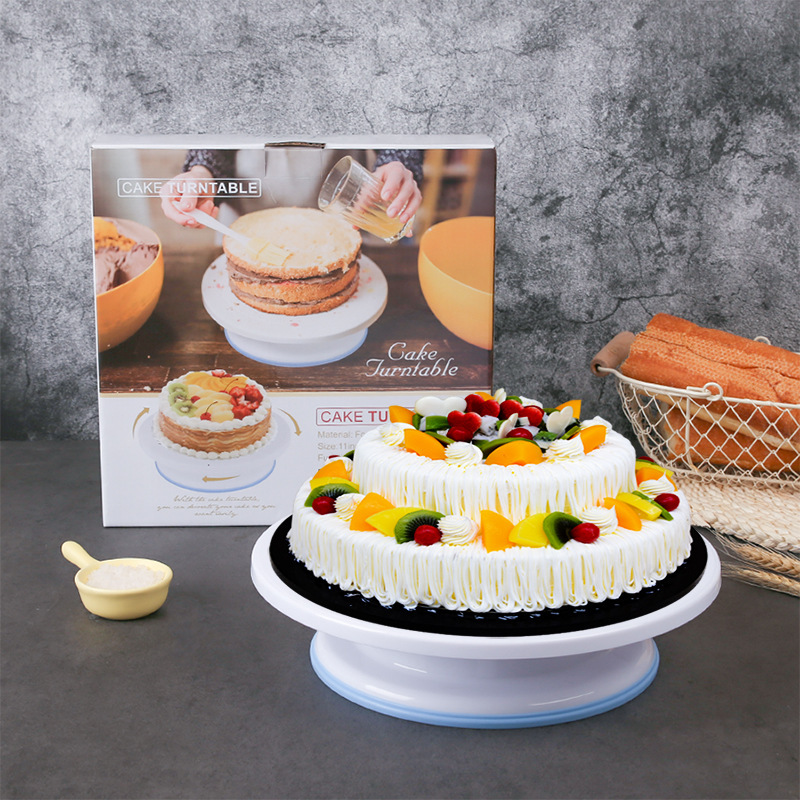 アマゾンのケーキの焙煎ツールのカラーボックスの11インチのクリームの表装の口はケーキの回転台の回転盤を飾ります。|undefined