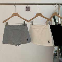 欧瑪莱の刺繍の馬の腰が高くてやせている半身のスカートのスカートはA字を包んでヒップのスカートの女性の夏の百合の3253を包みます。
