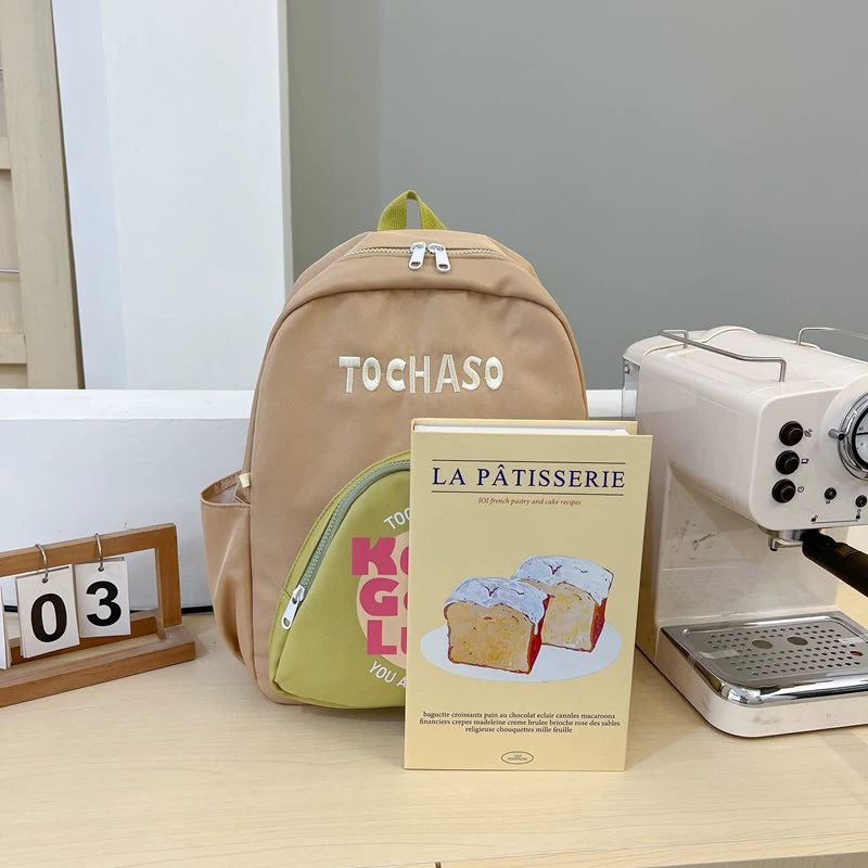 Big school bag with letters, capacious high quality backpack, simple and elegant design